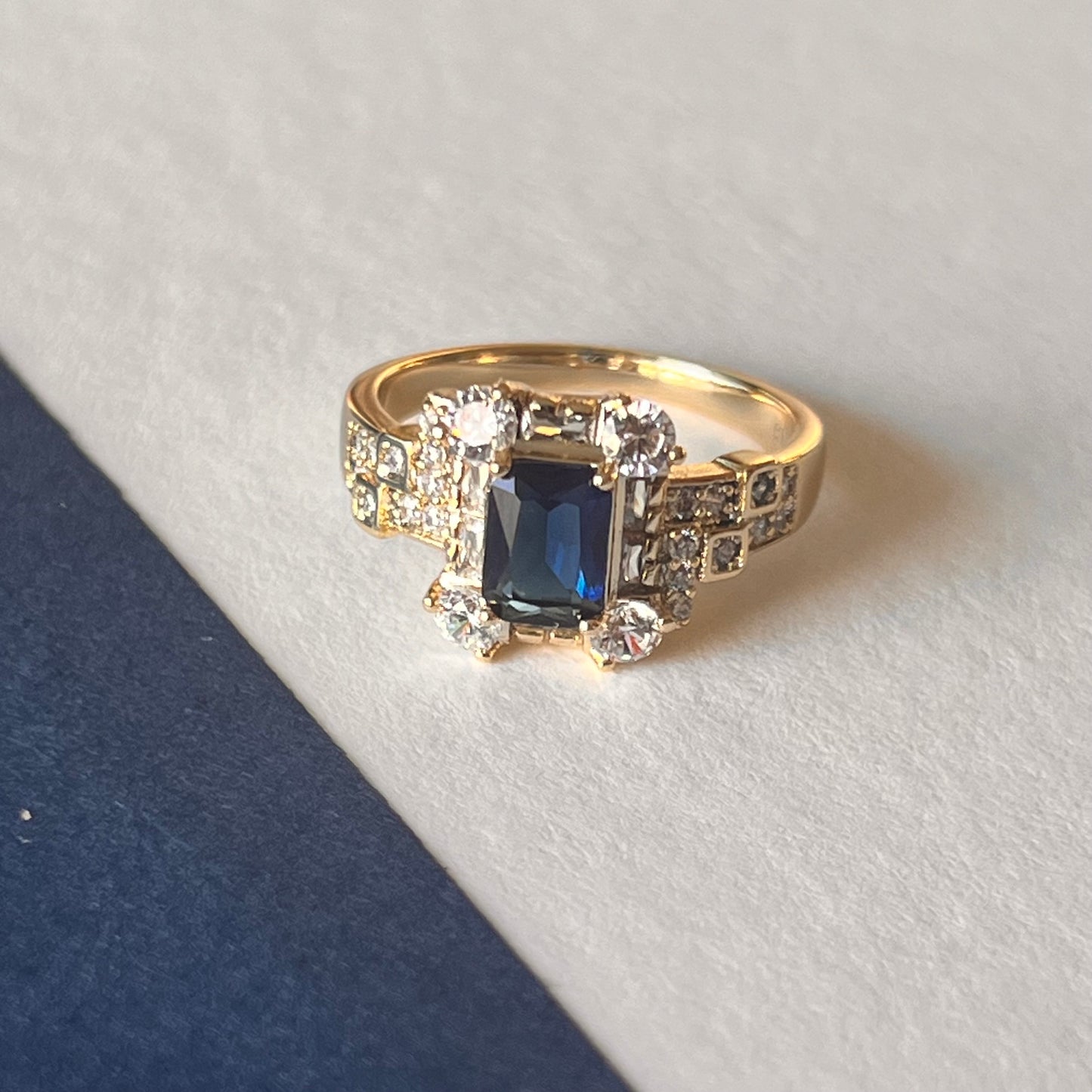 Vintage voyage ring with blue stone