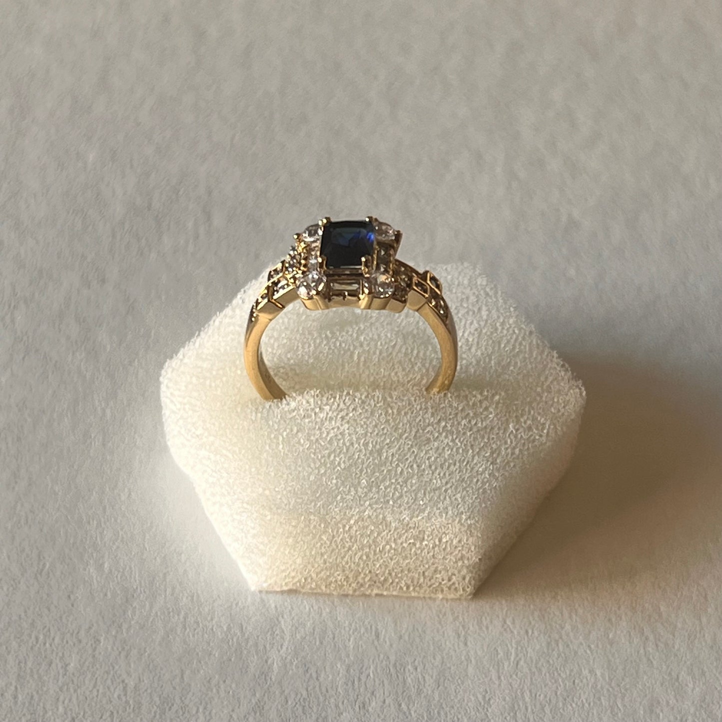 Vintage voyage ring with blue stone